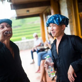 Local villagers visiting Topas Ecolodge and enjoy a glass of rice wine