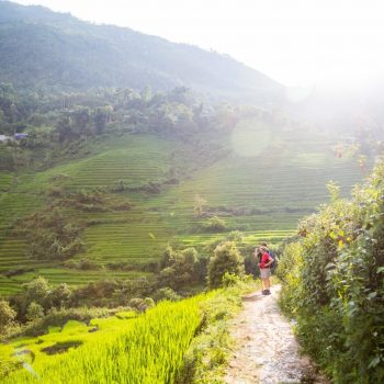 Hiking turist on the stunning hiking trails in Sapa mountains