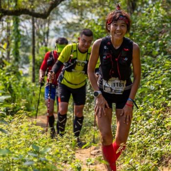 Exhausting and happy trail runner in Vietnam Mountain Marathon