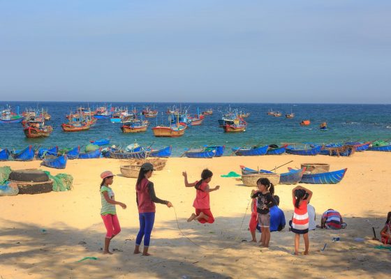 children play on the beach - Vietnam