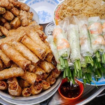 Asian street food. Traditional spring rolls in vietnamese night market